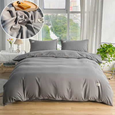 Housse de couette grise 150x200 cm sur lit queen