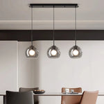 suspension lumineuse moderne sphères transparentes noir led salon salle manger éclairage intérieur
