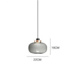 suspension lumineuse moderne transparente dorée ampoule câble noir minimaliste salle manger chambre