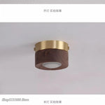 lampe moderne or noir bois brillant éclairage quotidien monté surface minimaliste