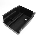 boîte rangement console centrale noire texture mat contemporaine clips fixations compartiments latéraux central lumière