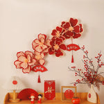 décorations florales mariage chinois fleurs rouges roses orangées caractères chinois éventails papier traditionnels festifs