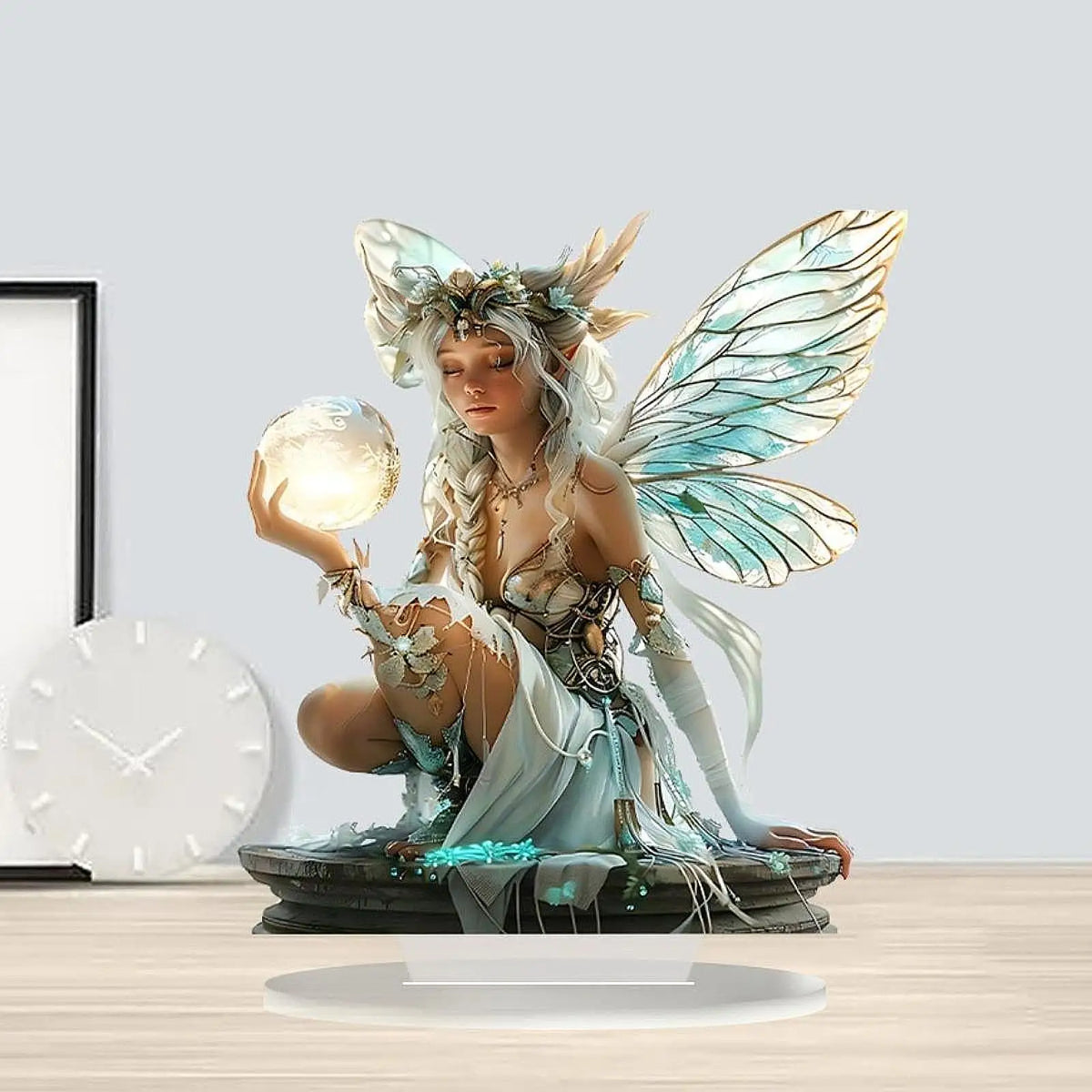 statue elfe féerique décoration table transparente ailes lumineuses motifs végétaux base blanche chambre