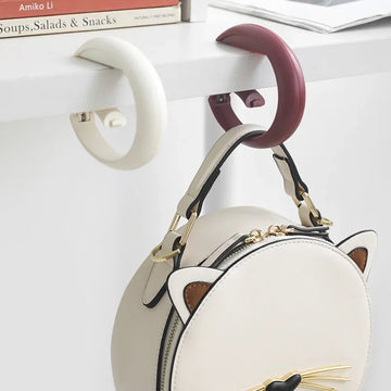 porte sac clip portable blanc rouge noir moderne pratique