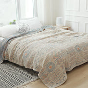 plaid bohème géométrique beige orange bleu coussins décoratifs salon détente