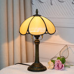 lampe table art déco bronze beige translucide motifs géométriques verre teinté base solide chambre