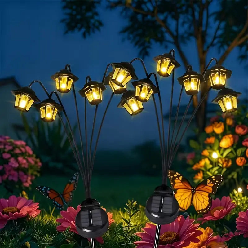lampe solaire moderne noire piquet led lumière chaude extérieure jardin allée chemin translucent ip65