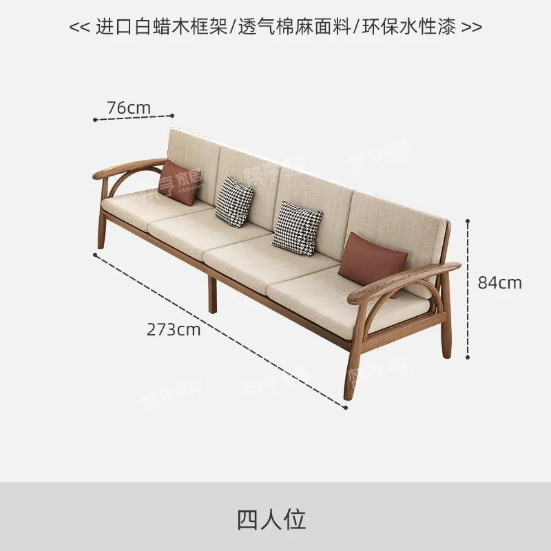 canapé places scandinave beige clair fauteuil pied poule moderne tapis géométrique terracotta blanc