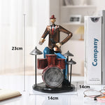 statues miniatures musiciens guitare saxophone trombone batterie décoration intérieure moderne stylisée