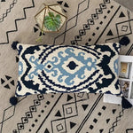 taies d'oreiller boho chic géométriques brodées couleurs vives pompons ethnique decoration intérieure respectueux environnement