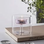 bougeoir transparent moderne bougie parfumée pied central rose minimaliste