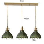 suspension lumineuse vintage vert doré motifs géométriques ampoules câbles chaînes métal