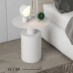 table basse ronde minimaliste moderne blanche noire salon décoration intérieure
