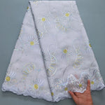 tissu voile brodé fleurs géométriques marron violet bleu clair polyester coton mariage décoration paillettes