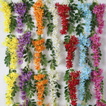 guirlande fleurs artificielles violettes blanches oranges rouges bleues jaunes feuilles vertes naturel intérieur 180cm