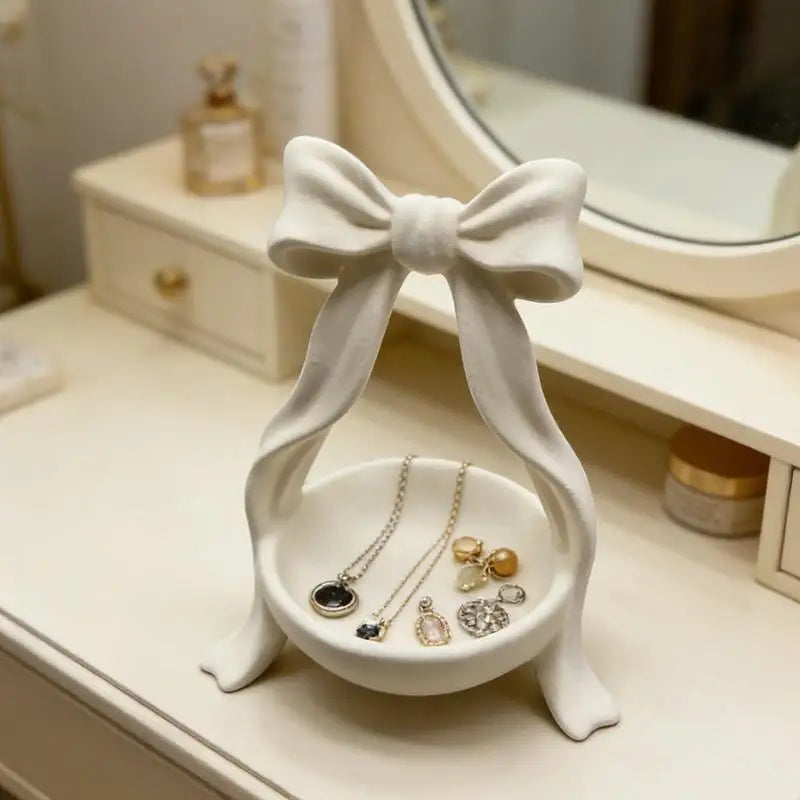 support bijoux blanc satiné nœud décoratif classique décoration intérieure rangement bijoux