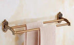 accessoires salle bain doré ornements sculptés finition brillante antique élégant porte serviettes savon toilette
