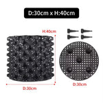 grille drainage plante noir moderne perforations circulaires différentes tailles incluses