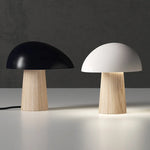Lampe de chevet design champignon LED dans une chambre à coucher moderne