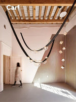 lustre suspension moderne minimaliste noir transparent doré globes organiques chambre salon