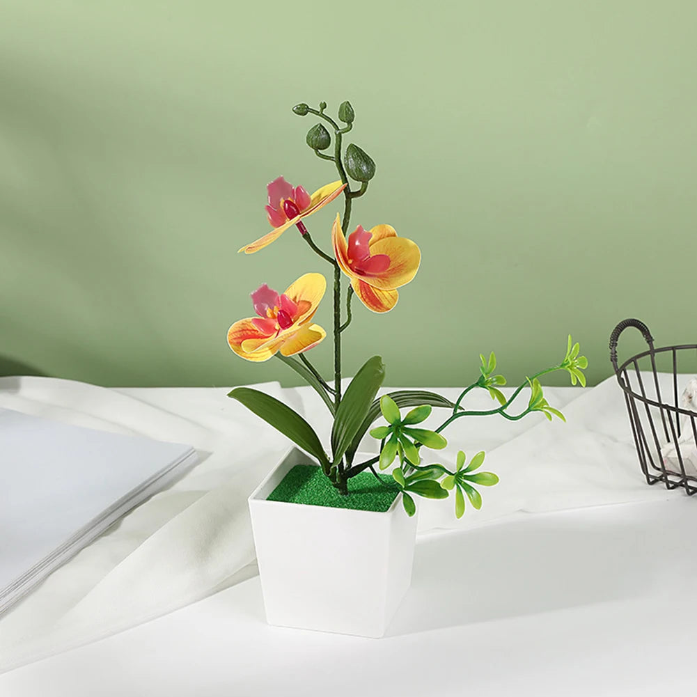 décoration intérieure orchidée artificielle pot blanc fleurs simples feuilles vertes moderne