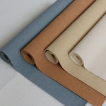 tapis polyester moderne minimaliste gris foncé beige bleu clair marron texture granuleuse décoration maison