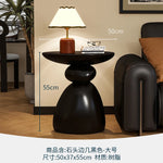 table basse ronde pierre moderne minimaliste sculptural couleur vive salon