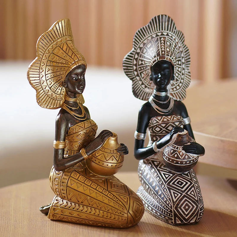 Sculpture africaine femme dorée sur table basse