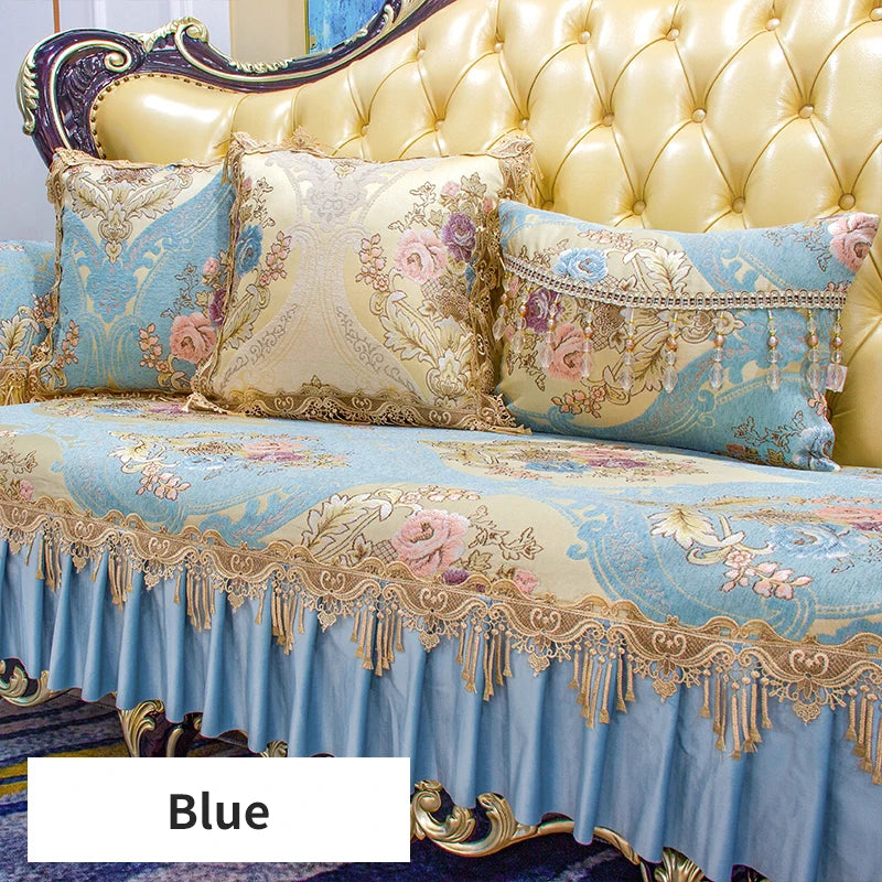 Ensemble de literie de luxe avec un motif floral sur fond bleu ciel et des détails dorés.