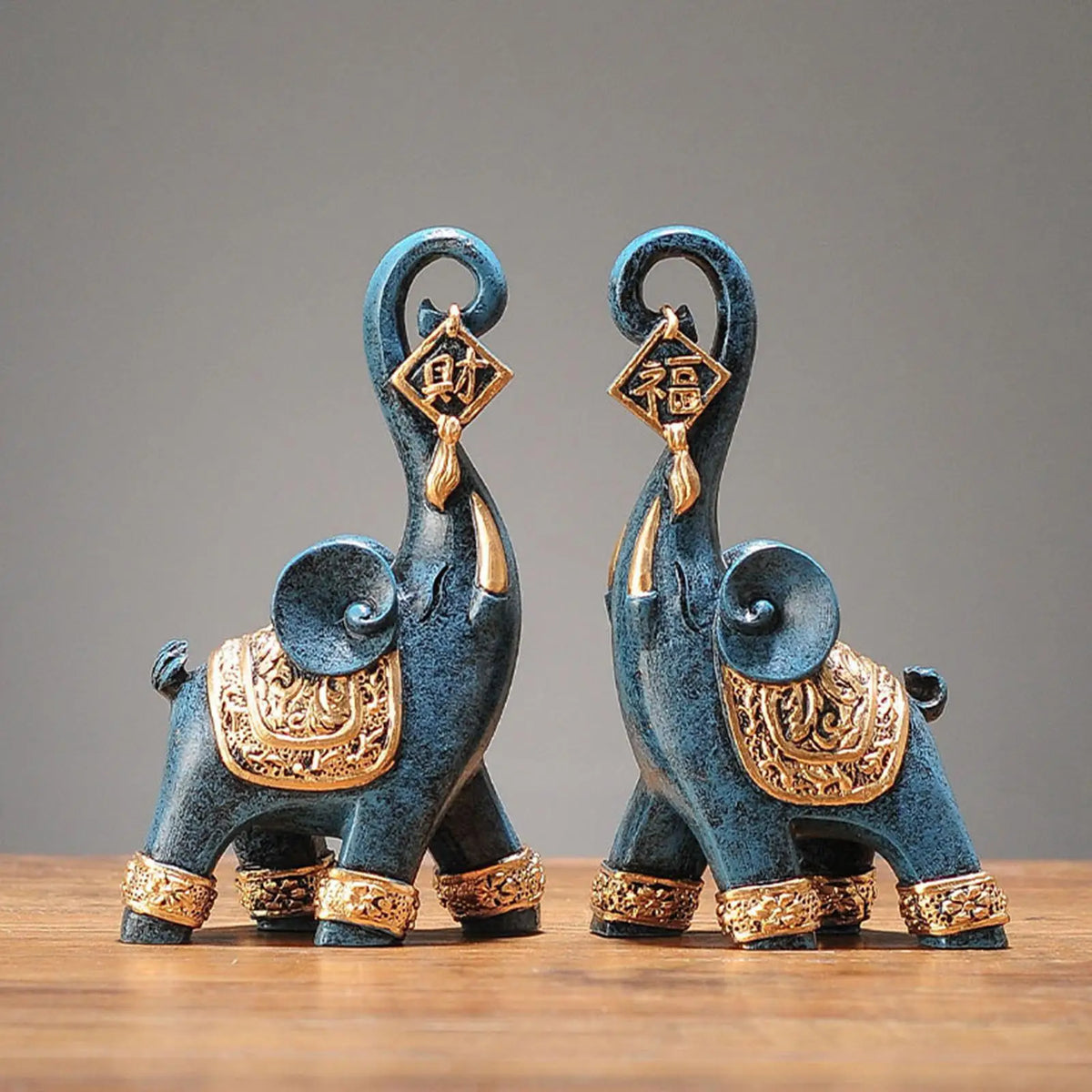 statues éléphants bleu doré motif sculpté détails asiatiques décor maison présentoirs résine moderne
