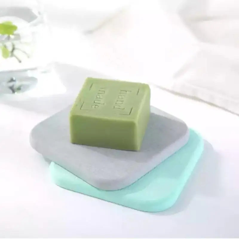 supports verre adhésifs tapis diatomées rond carré gris rose bleu texture granuleuse minimaliste maison