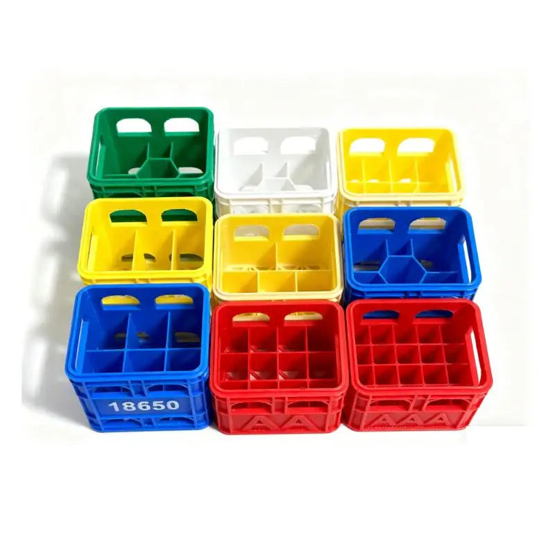 boîtes rangement piles vert blanc jaune bleu rouge grille compartiments pratique moderne