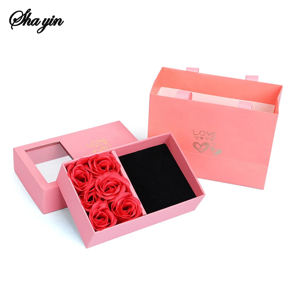 boîte dragées rose clair roses rouges classique carte vœux ruban bleu anniversaire mariage cadeau