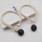 corde rideaux tressée beige rose noir moderne boules bois fixations rustique