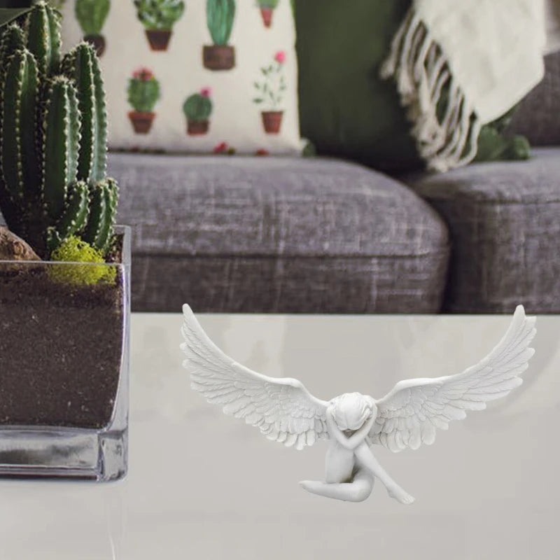 statue ange accroupi ailes plumes finition mate decoration blanche sculptural artistique tristesse