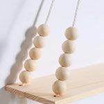 étagère murale suspendue macramé bois bois franges décoration boho chambre salon