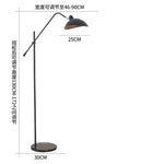 lampadaire sol moderne noir base marbre ajustable métal doré salon intérieur luxe
