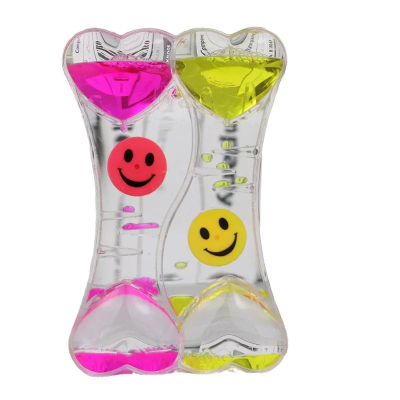 minuteur sablier liquide bicolore transparent motifs géométriques souriant deco moderne