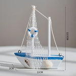 décoration maison bateau voile miniature blanc bleu clair coquillage étoile mer oiseau filet pêche