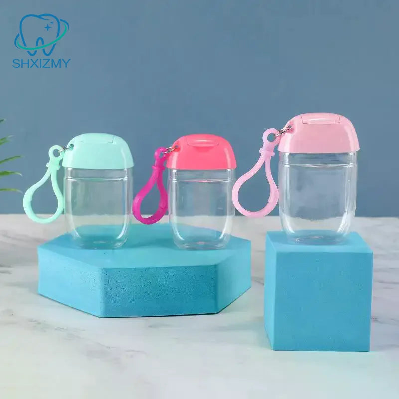 sac voyage bouteilles rangement transparentes couleurs vert bleu rose pratique moderne anneaux fixation