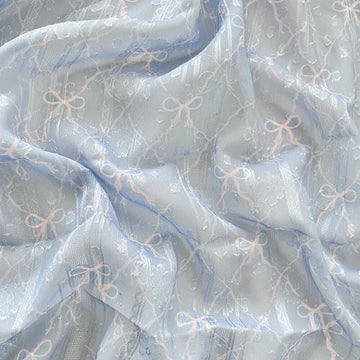 tissu polyester coton rose clair beige bleu clair motif nœuds fleurs élégant romantique 150cm
