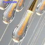 suspension lumineuse moderne cristal doré transparent gouttes verre led