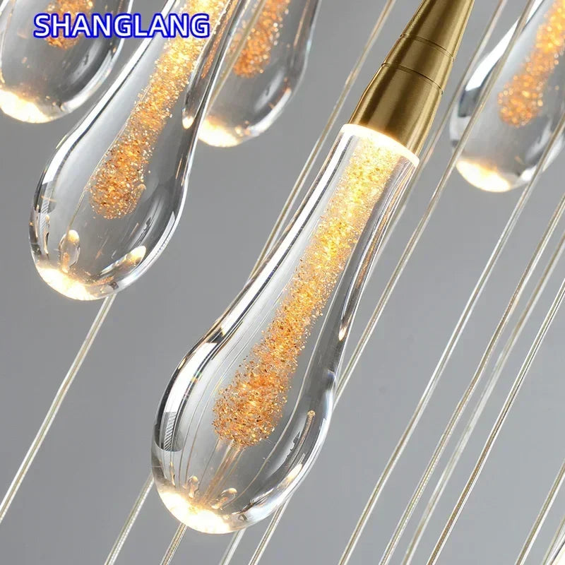 suspension lumineuse moderne cristal doré transparent gouttes verre led