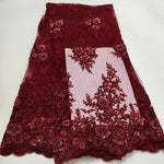 tissu dentelle brodée fleurs sequins rouge bordeaux blanc cassé rose pâle élégant translucide