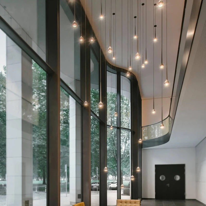 suspension lumineuse argentée gouttes pluie contemporaine fil 2000 82000 lumens chambre salon étude