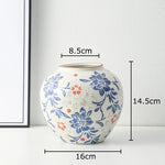 vase classique porcelaine fleurs blanc rouge bleu vert marron decoration table floral