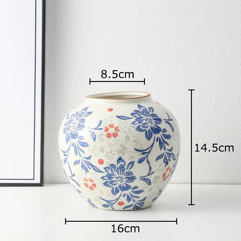 vase classique porcelaine fleurs blanc rouge bleu vert marron decoration table floral