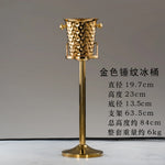 seau glace martelé support trépied métal argent doré vin champagne bar