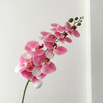 décoration intérieure vase orchidées artificielles fleurs douces feuilles vertes moderne élégant rose blanc violet