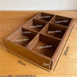 boîte compartiments bois marron foncé minimaliste respectueuse environnement réutilisable articles divers rangement moderne